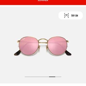 Rayban sunglasses. Round flat lenses polished gold frame with brown/pink lenses
